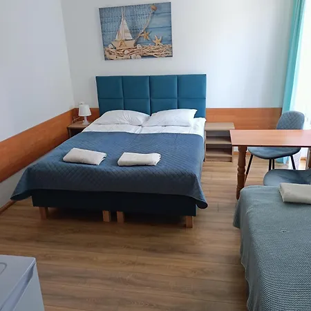 Quarto em Acomodações Particulares Goscinne U Marcina- Sala Zabaw, Basen, Melex, Rowery, Grill, Mini Dmuchaniec Ostrowo (Puck)