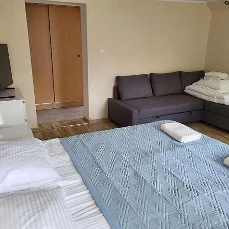 Quarto em Acomodações Particulares Goscinne U Marcina- Sala Zabaw, Basen, Melex, Rowery, Grill, Mini Dmuchaniec Ostrowo (Puck)
